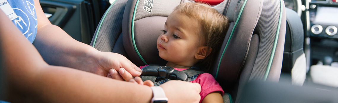 rear facing car seat touching front seat